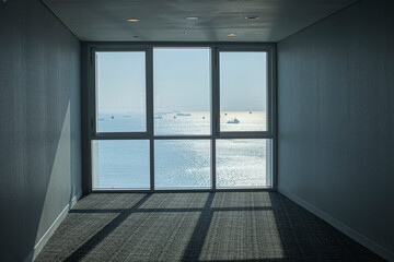 Sunlight enters through a window and cast square shadows