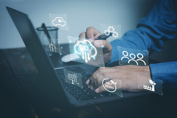 Businessman use a laptop touching CO2 reducing icon for decrease carbon dioxide emission carbon...