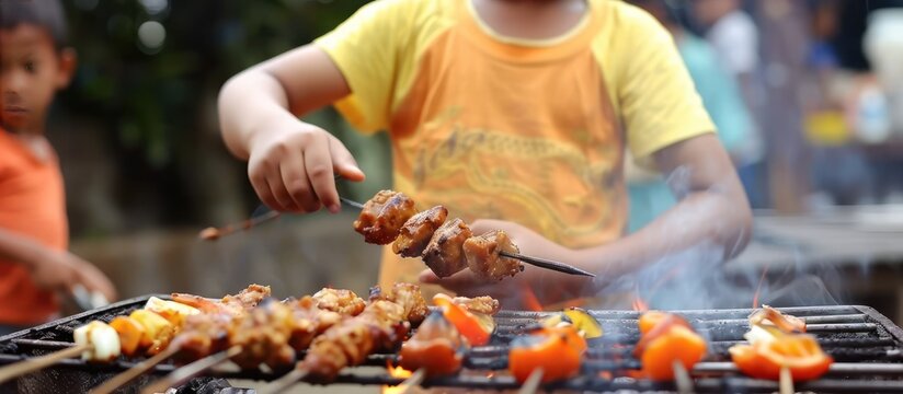 family cooking tasty food on barbecue grill