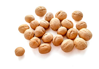 round walnut shell on white background