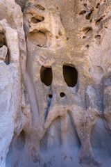 Skull shaped rock at Bandelier National Monument in New Mexico. Ancestral Pueblo people carved...