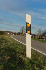 German guide post for a junction on the left side