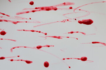 red splatters and streaks jam on white background