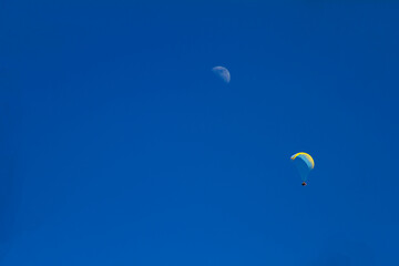 paragliding on blue sky