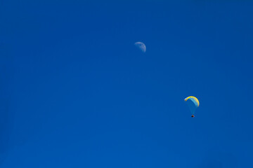 paragliding on blue sky