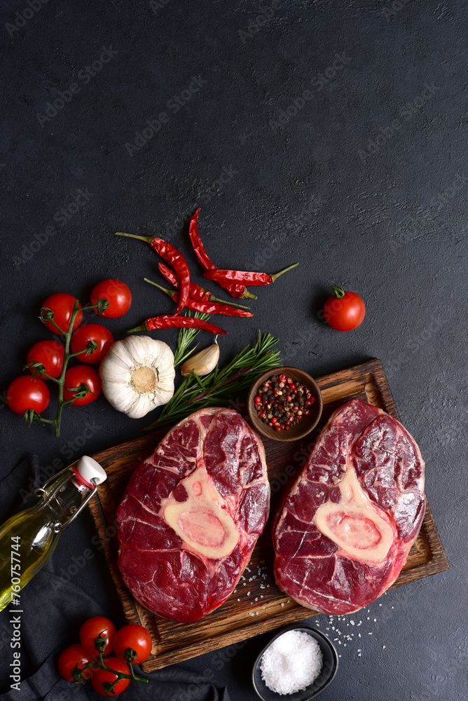 Poster Ingredients for making traditional italian meat dish ossobuco. Top view with copy space.