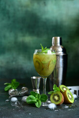 Kiwi cocktail with mint.