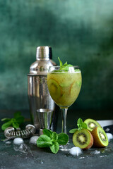 Kiwi cocktail with mint.