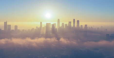 Hazy sunrise over the urban skyline
