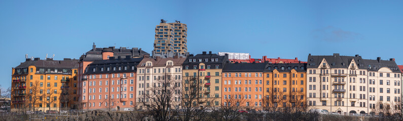 Panorama, old apartment houses on a hill and the towers Norra Tornen in the district Vasa Stan, a...