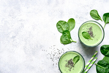 Detox spinach smoothie in a tall glass. Top view with copy space. - 760777908