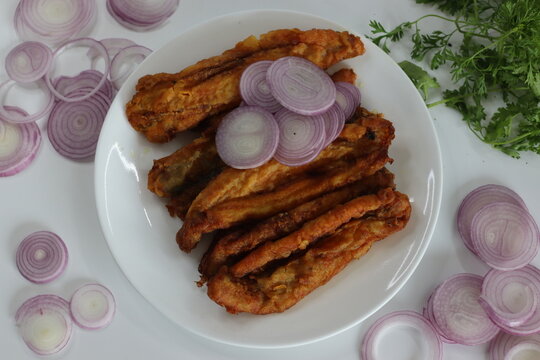 Golden crispy Bombil fish fry, delectable seafood dish popular in Mumbai coastal cuisine