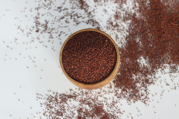 Ragi grains in rustic wooden bowl,
