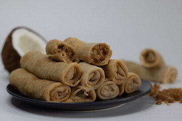 Coconut jaggery crepes. South Indian cuisine, sweet dessert