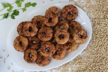 Barley Vada or fritters. Golden fried hulled barley vadas, crispy, healthy, vegetarian snack