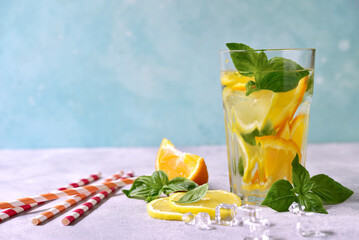 Cold summer orange lemonade with basil. - 760779711