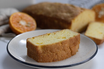 Fototapeta na wymiar Slices of Orange pound cake, also known as citrus loaf cake or orange butter cake