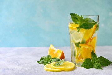 Cold summer orange lemonade with basil. - 760780308