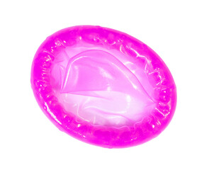 Pink condom isolated on white