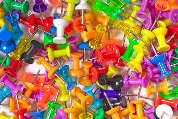 Many colorful push pins, isolated - 760782778