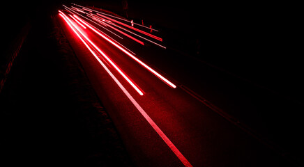 lights of cars driving at night. long exposure