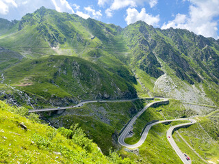 Winding road high in the mountains on a summer day