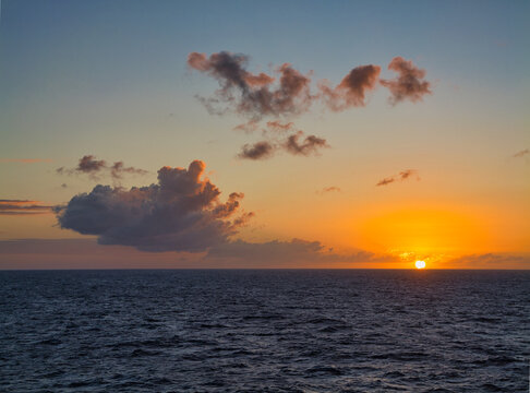Sunset over a tranquil sea in the Caribbean - taken from a cruise ship.