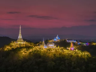 Fotobehang Aerial photo of Phra Nakhon Khiri ( Khao Wang ), the hilltop summer palace of Thai King Rama IV, with sunset in the background. Phetchaburi, Thailand. © SANCHAI