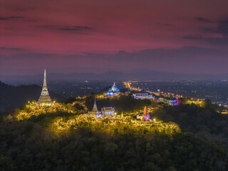 Aerial photo of Phra Nakhon Khiri ( Khao Wang ), the hilltop summer palace of Thai King Rama IV, with sunset in the background. Phetchaburi, Thailand. - 760800970