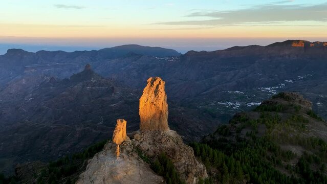 Aerial shot picturesque paradise of Roque Nublo, Flight over of a volcanic rock in caldera of Tejeda, Gran Canaria, Canary islands, Spain.