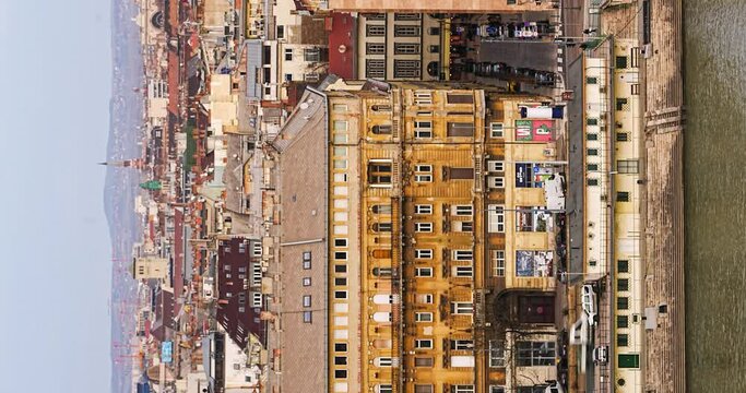 Budapest, Havas street, Hungary: February 21, 2024: Aerial cityscape view. Time-lapse, move transition. Vertical orientation.