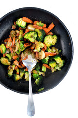 Pan with sauteed grilled vegetables seen from above