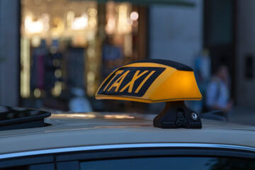 Illuminated German taxi sign