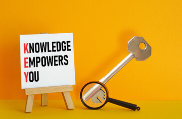 Knowledge Empowers You KEY is shown using the text and photo of the key