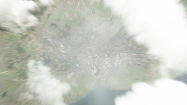 Earth zoom in from space to Newport, United Kingdom. Followed by zoom out through clouds and atmosphere into space. Satellite view. Travel intro. Images from NASA