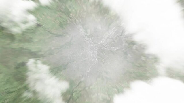 Earth zoom in from space to Sheffield, United Kingdom. Followed by zoom out through clouds and atmosphere into space. Satellite view. Travel intro. Images from NASA