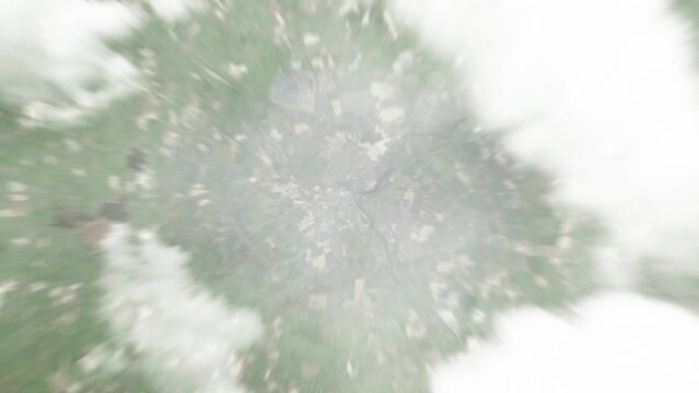 Earth zoom in from space to Navan, Ireland. Followed by zoom out through clouds and atmosphere into space. Satellite view. Travel intro. Images from NASA