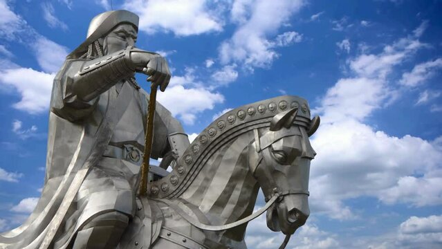 Genghis Khan on a horse statue in Mongolia moving clouds time lapse. Founder of Mongol Empire