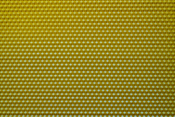 Background texture and pattern of section voshchina of wax honeycomb from a bee hive for filled with honey. Voshchina an artificial basis for the construction of honeycombs, sheet of wax of cells