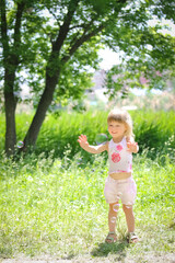 happy child having fun playing in the nature park