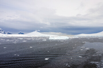 Antarctica landscape, with icebergs and dark waters, in what is probably the most authentic landscape in the world.
