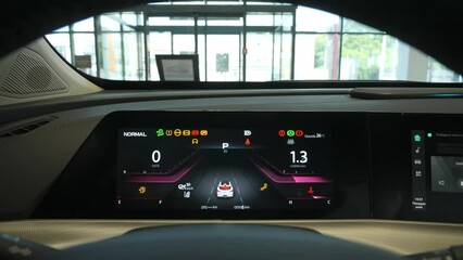 Close-up of an electronic dashboard in a modern car. - Powered by Adobe