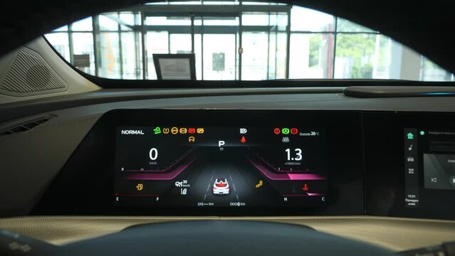 Close-up of an electronic dashboard in a modern car. 