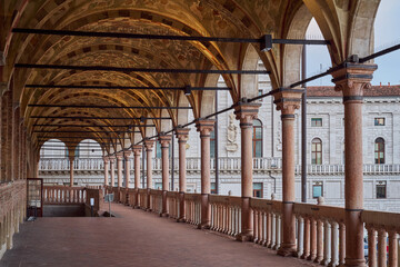Arcade of Palazzo della Ragione, medieval market hall in Padua, Italy - obrazy, fototapety, plakaty