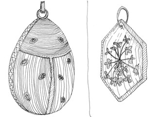 sketches of two different pendants drawn by hand in black ink on white paper - 760849772