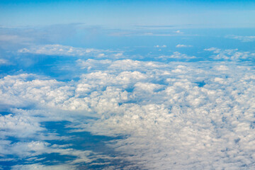 Clouds and blue sky, view from airplane