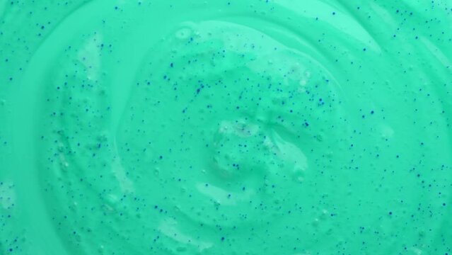 Scrub background texture. Skin care, body or facial scrub backdrop rotating. Cosmetic product 