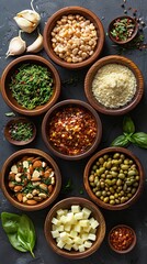 Fototapeta premium Various types of grains and cereals in white cups on a dark background with green basil leaves. Concept: healthy eating and culinary blogs, articles about veganism and vegetarianism