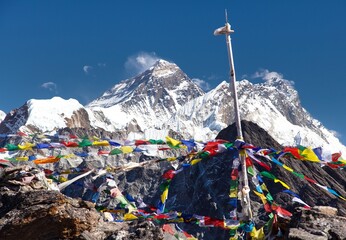 Mount Everest and Lhotse with buddhist prayer flags - obrazy, fototapety, plakaty