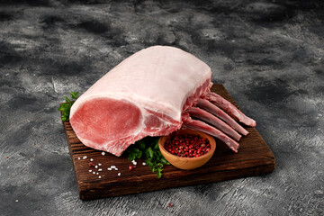 Pork meat with bones on wooden board - 760869784